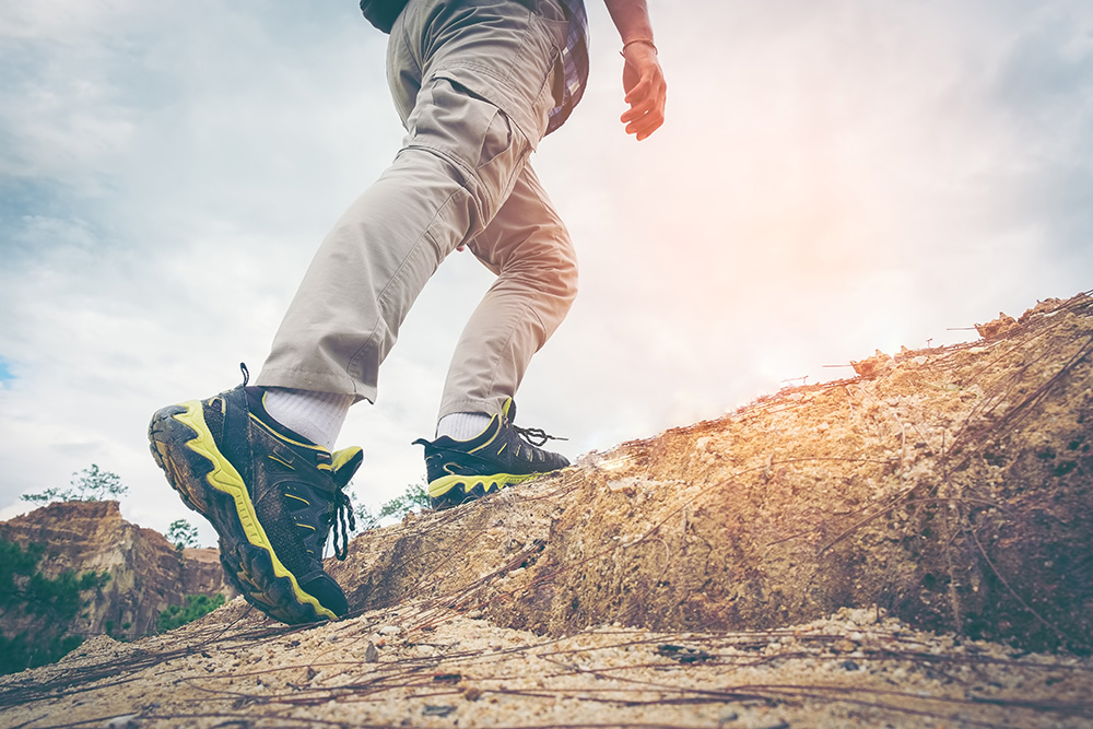 man hiking for physical fitness